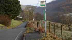 A bus stop on a rural Welsh road.