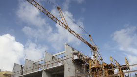 A crane and a partially constructed building
