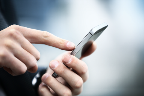 A person using a smart phone