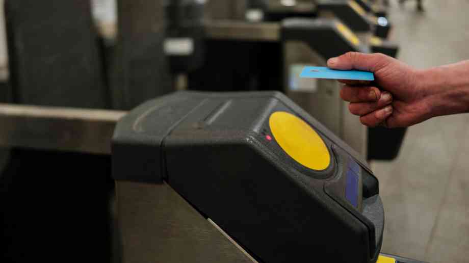 Turnstile in train station Turnstile in train station