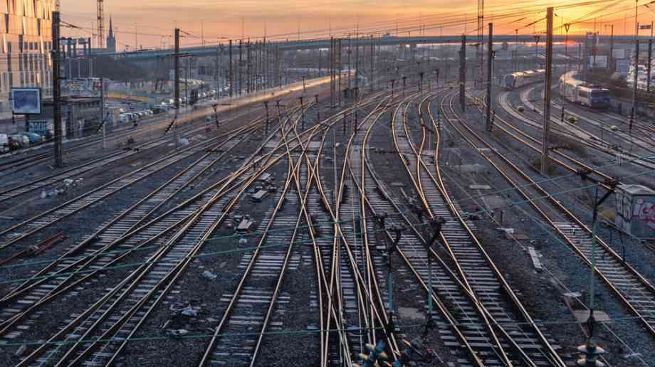 Aerial view of railway track at sunset.