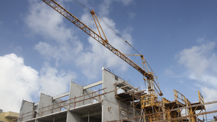 A crane and a partially constructed building