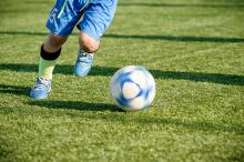 Kid playing football