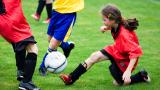 Kid playing football
