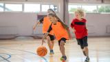 Kids playing basketball