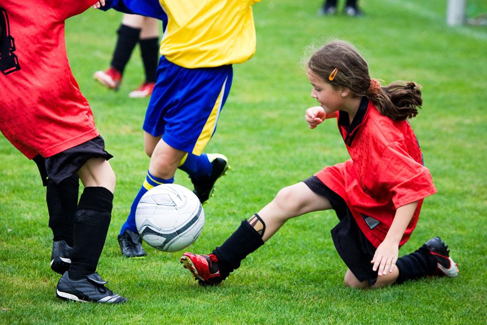 Kid playing football